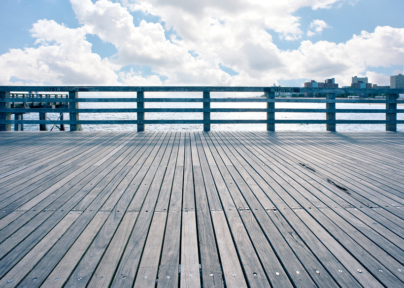 Empty pier at Coney Island beach, New York City.